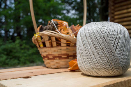 yarn for knitting in balls in the wood backgroundの写真素材
