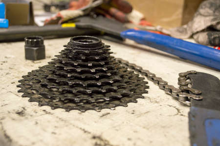 tools and parts for the repair of a bicycle in the workshop