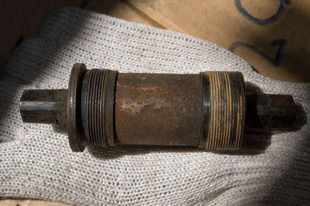 tools and parts for the repair of a bicycle in the workshop