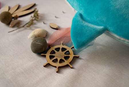 stitched stuffed toys for babies on a wood background