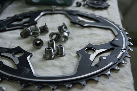 tools and parts for the repair of a bicycle in the workshop
