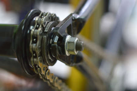 tools and parts for the repair of a bicycle in the workshop