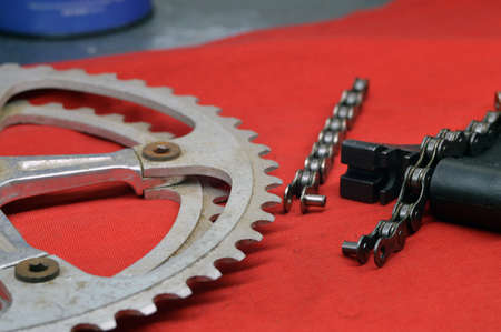 tools and parts for the repair of a bicycle in the workshop