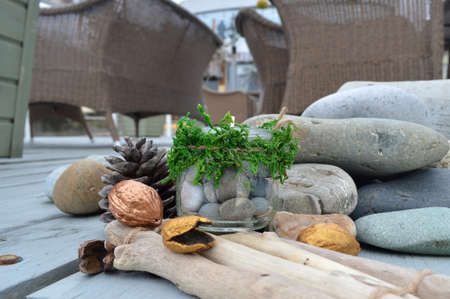 New Year composition with a glass candlestick in the wooden backgroundの写真素材