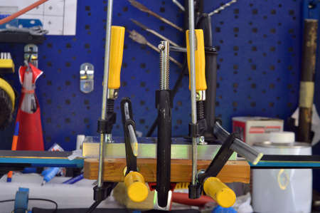 repair of ski and snowboard in the workshop