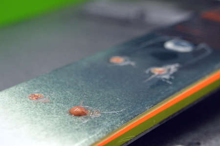 repair of ski and snowboard in the workshopの写真素材