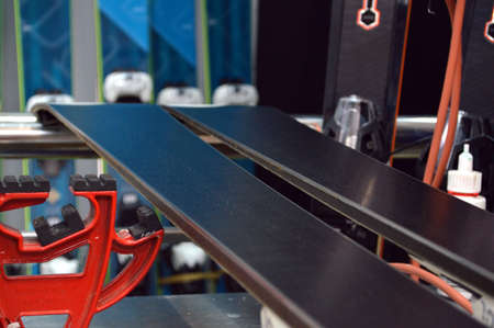 repair of ski and snowboard in the workshopの写真素材