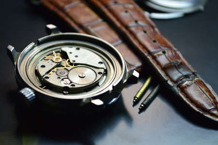 watch mechanism in a repair workshopの写真素材