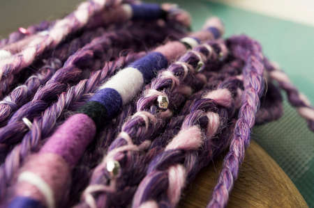 braids on a wood background at close rangeの写真素材