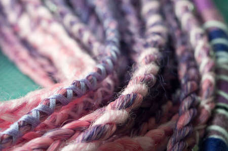 braids on a wood background at close rangeの写真素材
