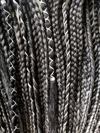 Double ended synthetic braids black and white close up