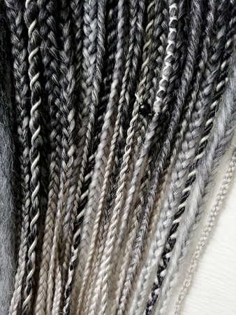 Double ended synthetic braids black and white close upの写真素材