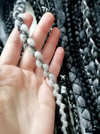 Double ended synthetic braids black and white close up