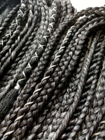 Double ended synthetic braids black and white close up