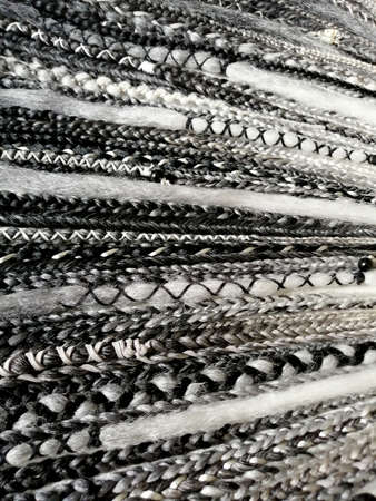 Double ended synthetic braids black and white close up