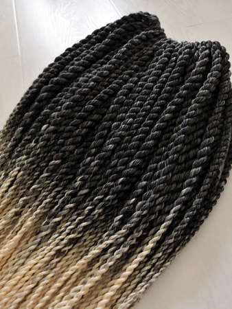 Double ended synthetic braids black and white close up