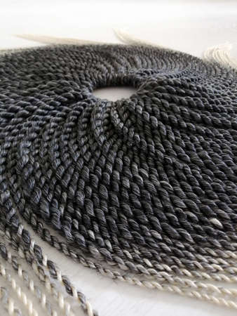 Double ended synthetic braids black and white close up