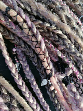 Bohemian hair accessory textured braids close upの写真素材