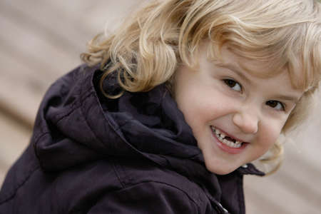 smiling young blond girlの写真素材