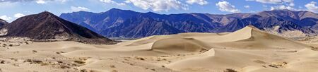 Panomaric view of sand dunes in a desert area of the Tibetan Plateau near Samye Monastery - Tibetの写真素材