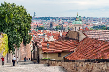 Prague, Czech Republic - August 25 2008: Prague cityscape from Castle stairs with view of Charles Bridge and St. Nicholas Churchのeditorial素材