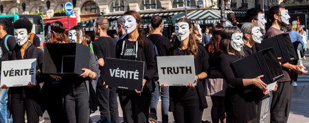 Paris, France - March 31, 2019: Anonymous for the Voiceless demonstration in Paris. AV holds an abolitionist stance against animal exploitation and promotes a vegan messageのeditorial素材