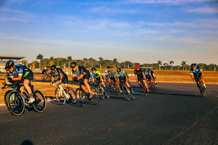 Group of cyclists riding on the road.の写真素材