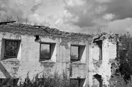 Ruins of an old building with windows. Black and white.の写真素材