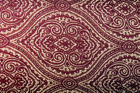 Beautiful damask burgundy fabric backgroundの写真素材