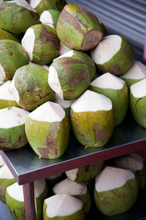 Fresh coconuts on to Asian Marketの写真素材