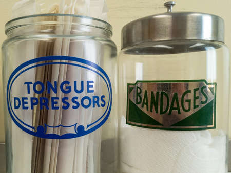 Medical supplies in jars in exam roomの写真素材