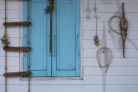 Fisherman life on the wallの写真素材