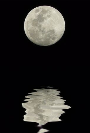 The Moon with a water reflectionの写真素材