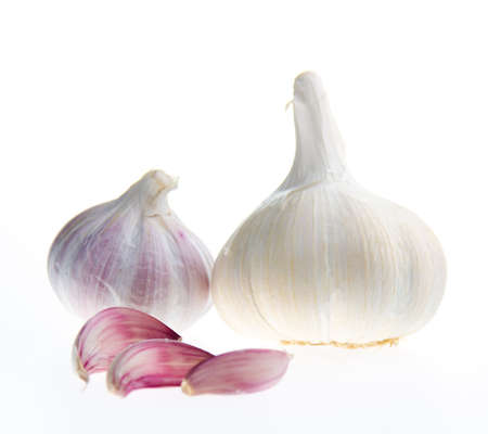 Garlic bulbs isolated on white backgroundの写真素材