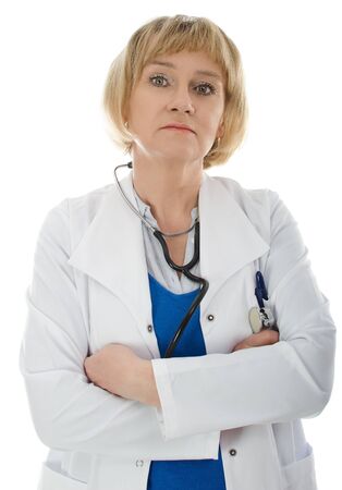 Mature woman doctor wearing white coat isolated on white backgroundの写真素材