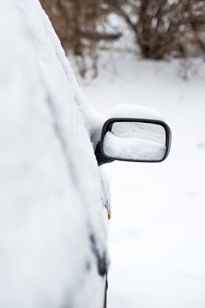 Picture of car buried in snow on city parkingの写真素材