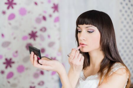 Portait of the bride during the wedding preparationの写真素材
