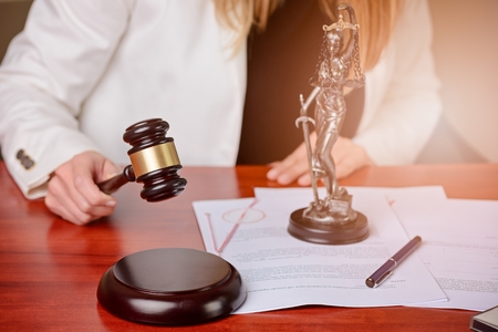 Woman holding judge gavel. Law Officeの写真素材
