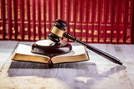 Gavel the symbol of law in court library with legal codes. Law conceptの写真素材