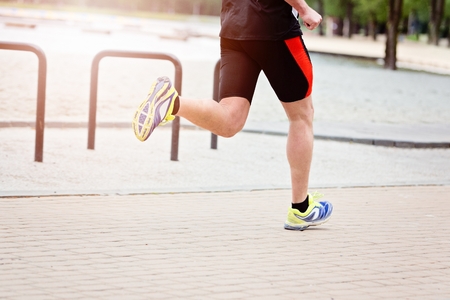 Men running alone in park - marathon Healthy lifestyleの写真素材