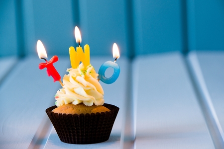 Birthday's cake - cupcake with a candles for 2 - second birthday . Happy birthday !の写真素材