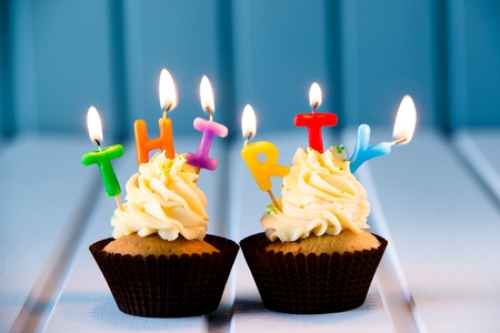 Birthday's cake - cupcake with a candles for 30 - thirtieth birthday . Happy birthday !の写真素材