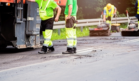 Summer road work. Road renewal. Traffic Jamの写真素材
