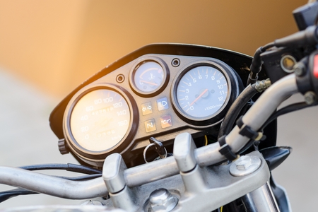 Classic motorbike control panel with speedometer and revs counterの写真素材