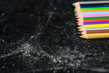 Back to school. Blackboard with coloured pencilsの写真素材