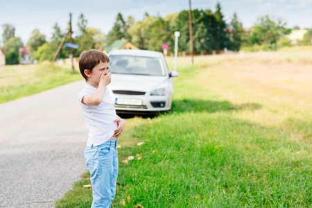 Seven years old child feeling bad - suffers from motion sicknessの写真素材