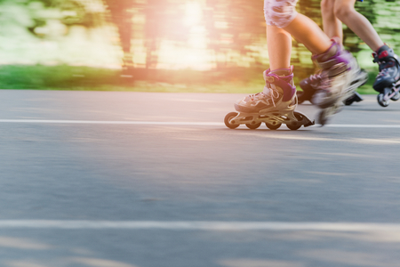 Rollerblading on asphalt road. Summer sunny dayの写真素材