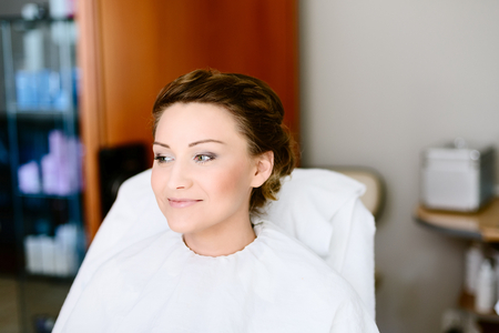 Wedding makeup for bride. Wedding preparations. Bridal morning of a cute lady. Wedding day.の写真素材