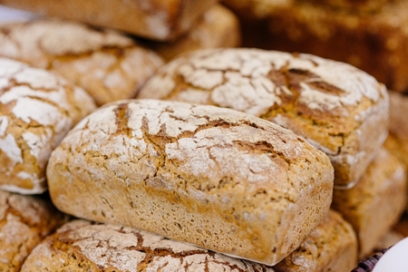 Loaves of fresh crunchy whole grain bread