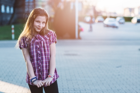 Portrait of happy blond hair ten years old blue eyed girlの写真素材